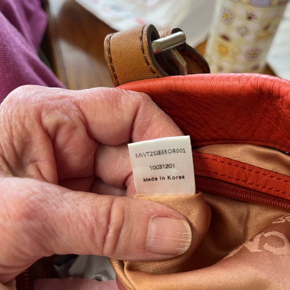MCM Orange embossed leather handbag EUC - Picture 8 of 12